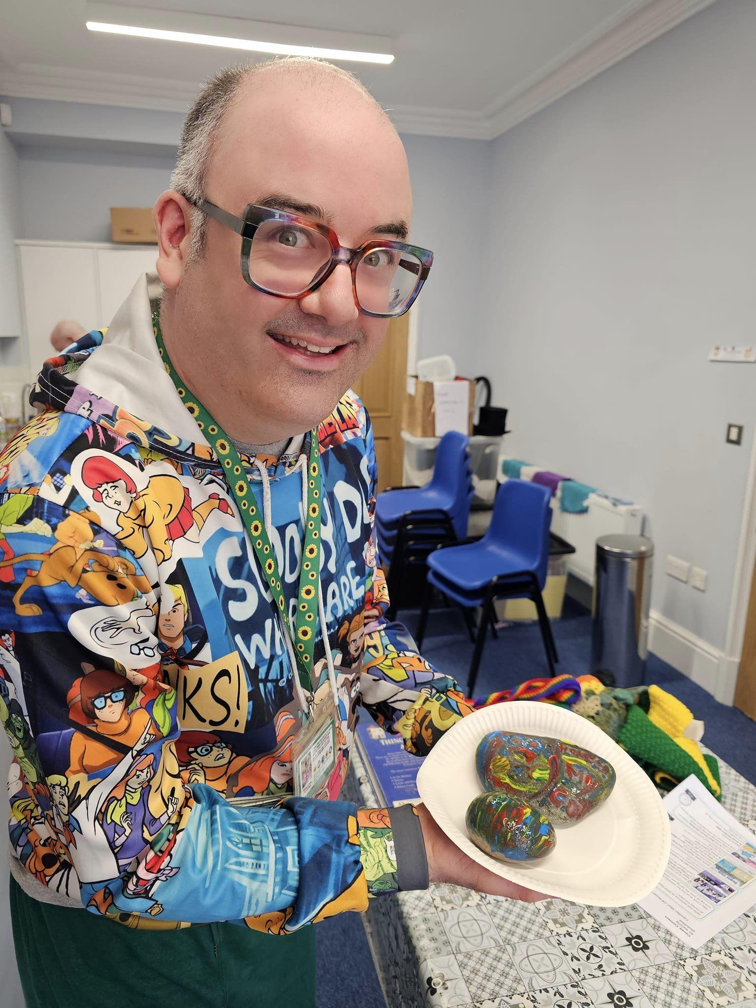 Photo of visitor with pebble Craft 